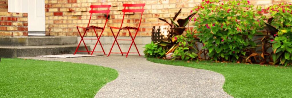 Way with perfect grass landscaping with artificial grass